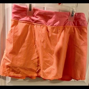 Lululemon golf skirt orange, white and pink size 6